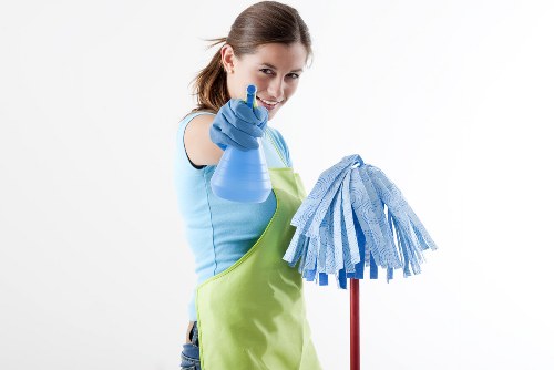 Office cleaning team working in a Harrow workplace reception area